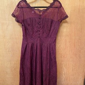 Lace dress with short sleeves, knee length.